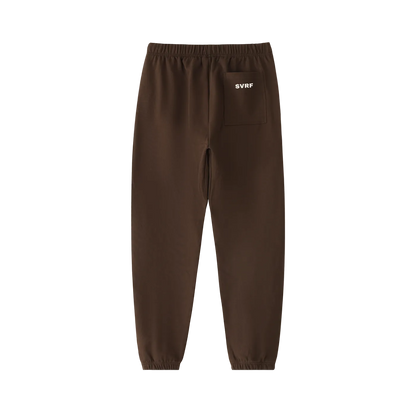 Coffee brown SVRF Core Sweatpants, back, showing the rear patch pocket and cuffed ankles