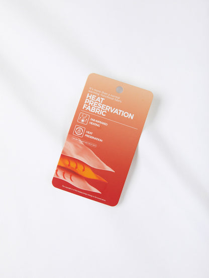 Hangtag for the heat-preserving fleece fabric used in the SVRF Raglan Hood