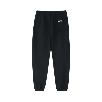 Black SVRF Core Sweatpants, back, showing the rear patch pocket and cuffed ankles