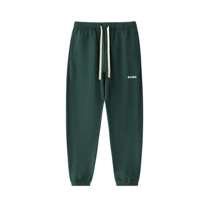 Forest green SVRF Core Sweatpants, front, showing the drawcord waist and the SVRF logo on the right thigh
