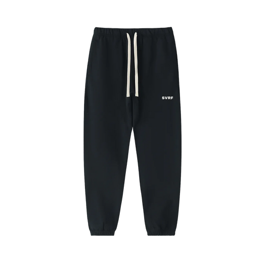 Black SVRF Core Sweatpants, front, showing the drawcord waist and the SVRF logo on the right thigh